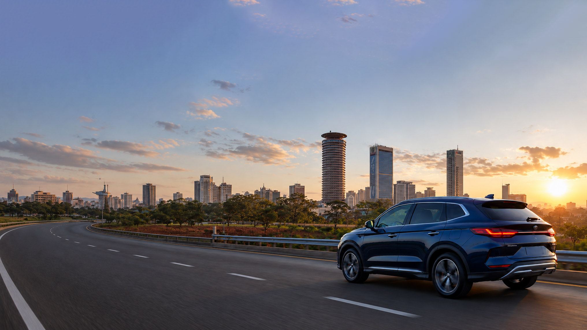 A car driving at sunset with the Nairobi skyline behind